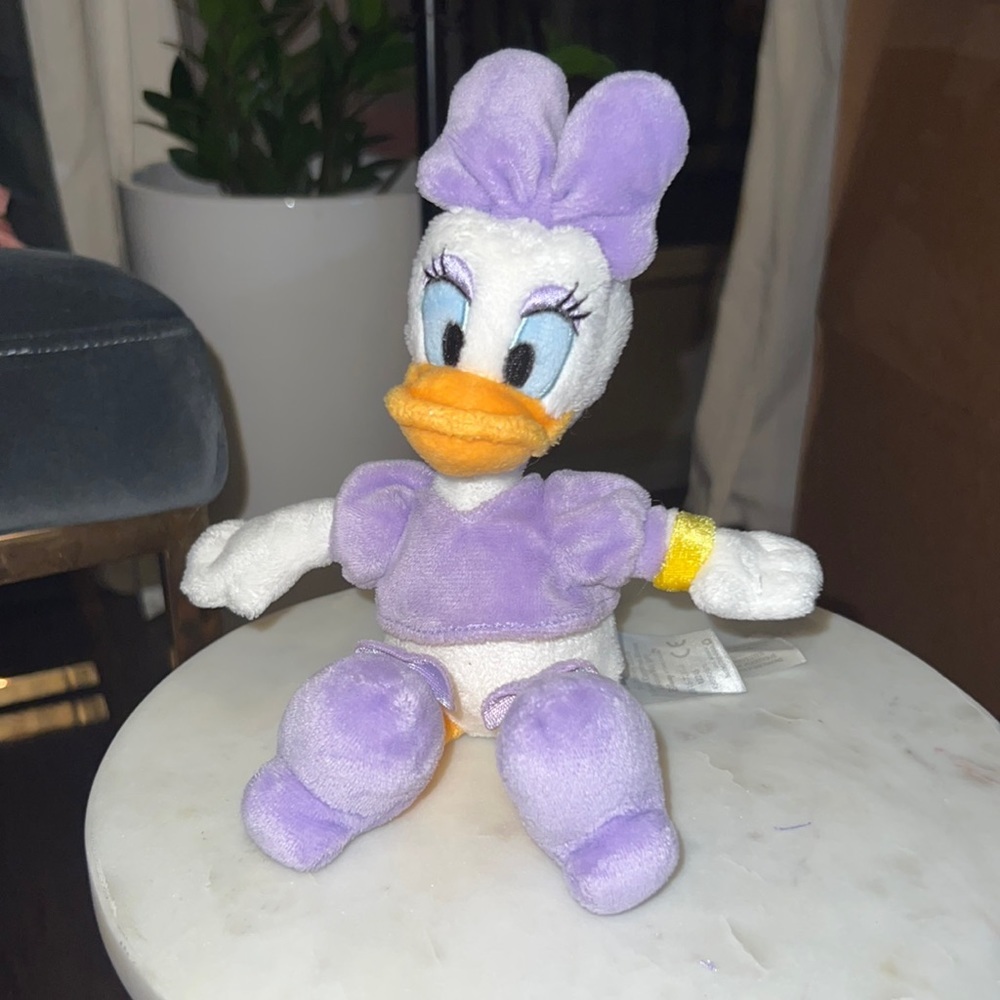 Disney Daisy Duck authentic original Disney Parks light purple & white & yellow - Picture 2 of 9